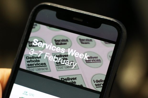 A closeup of a smartphone display showing Services Week, 3–7 February